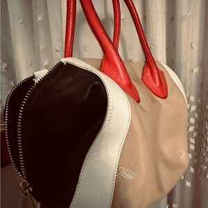 Red and Tan Satchel Bags with Unique Designs